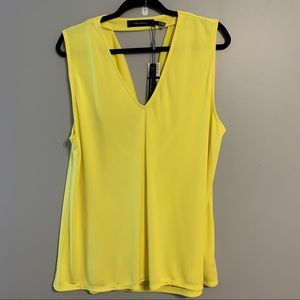 NWT Yellow sleeveless blouse with drape back